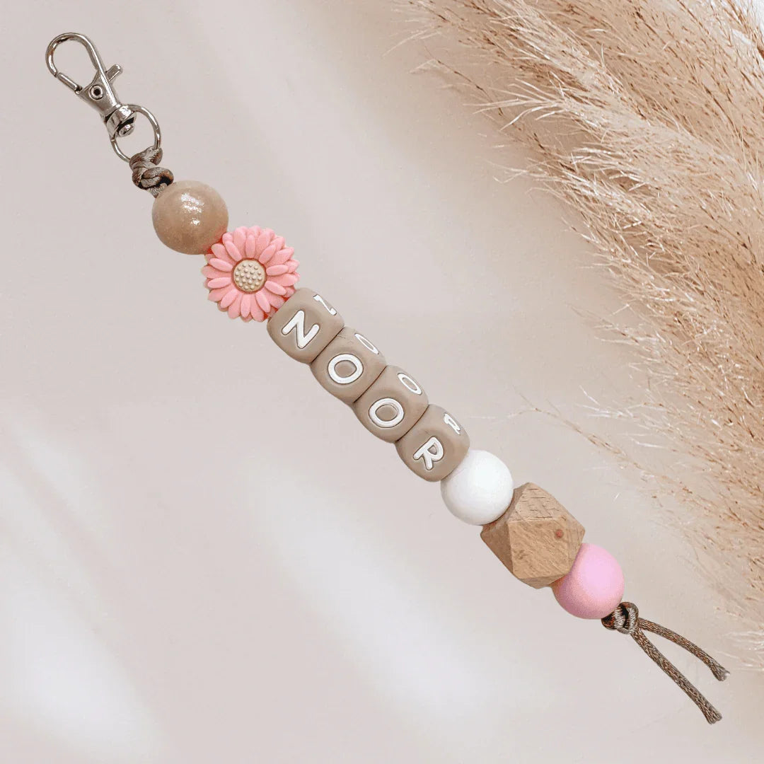 Sleutelhanger met naam goud roze bloem
