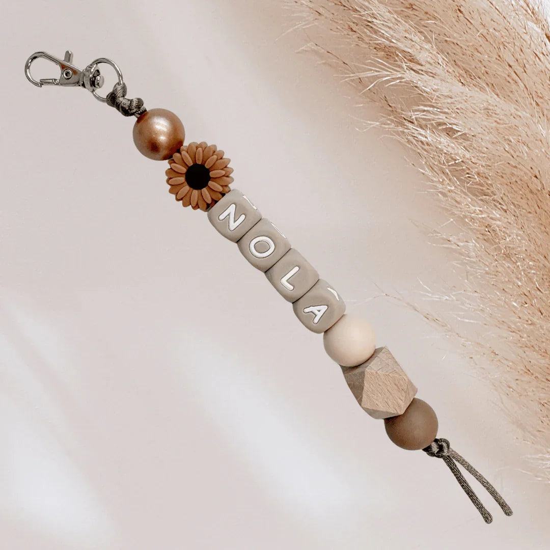 Sleutelhanger met naam bloem bruin brons