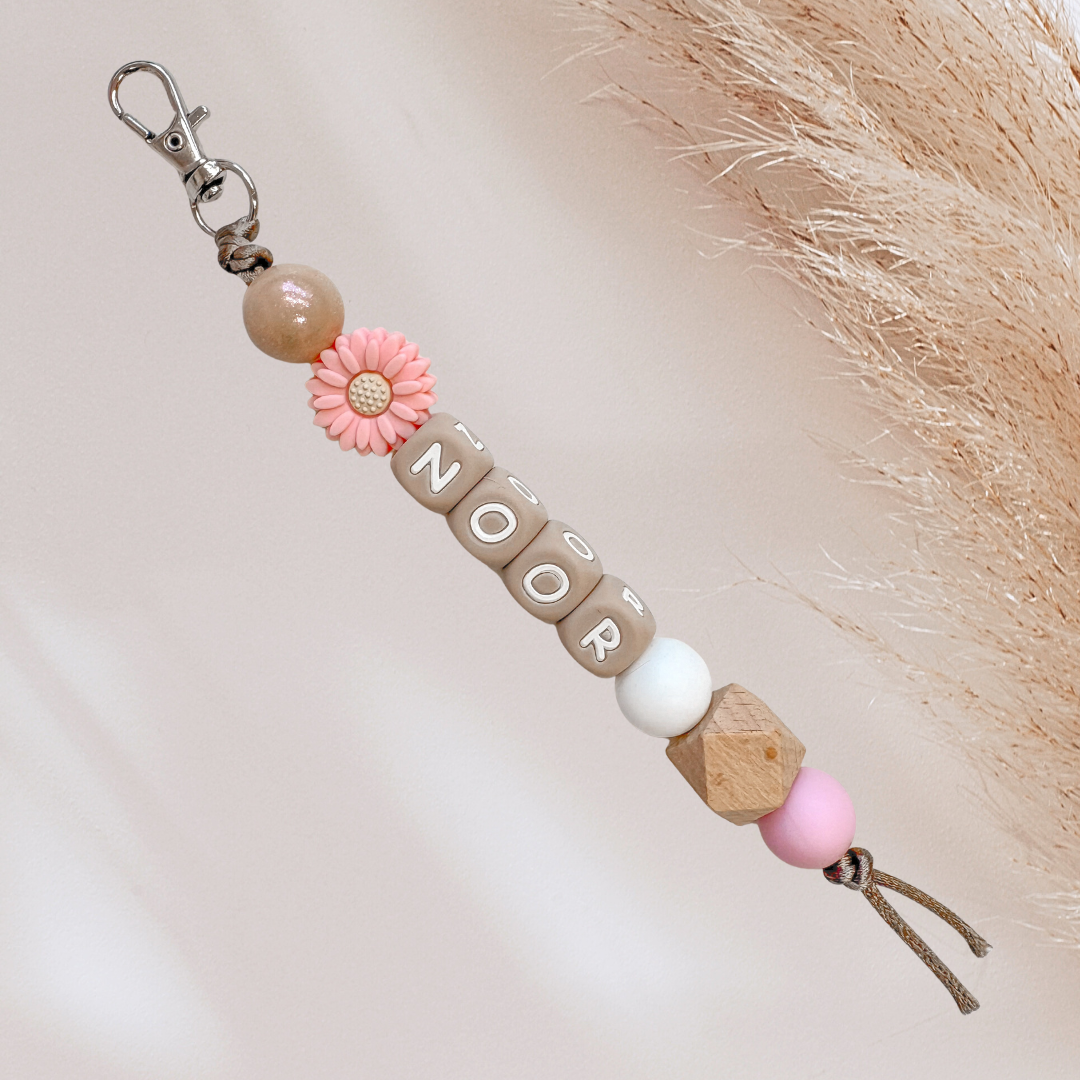 Sleutelhanger met naam goud roze bloem