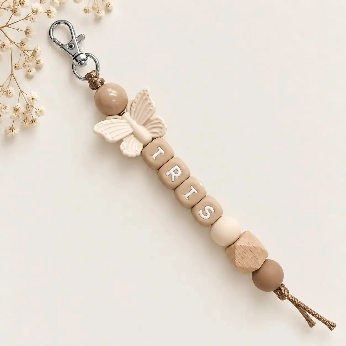 Sleutelhanger met naam vlinder goud naturel
