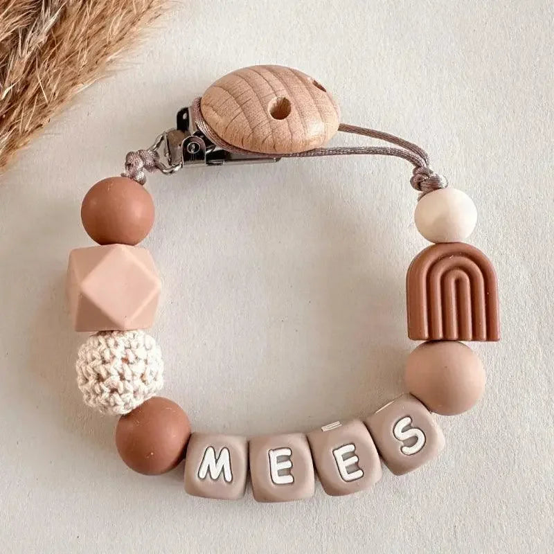 Speenkoord met naam – Regenboog Caramel - MiniDulce