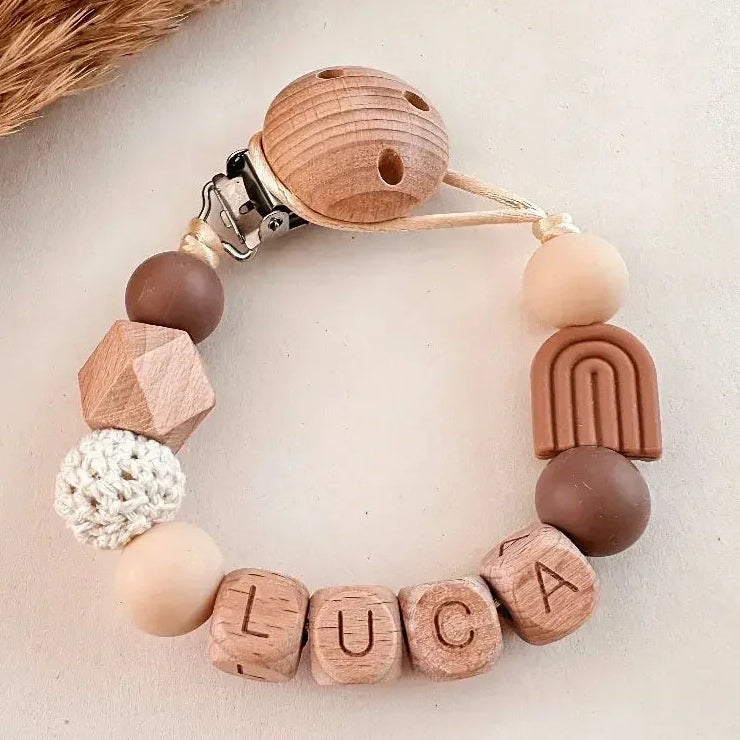 Speenkoord met naam regenboog caramel