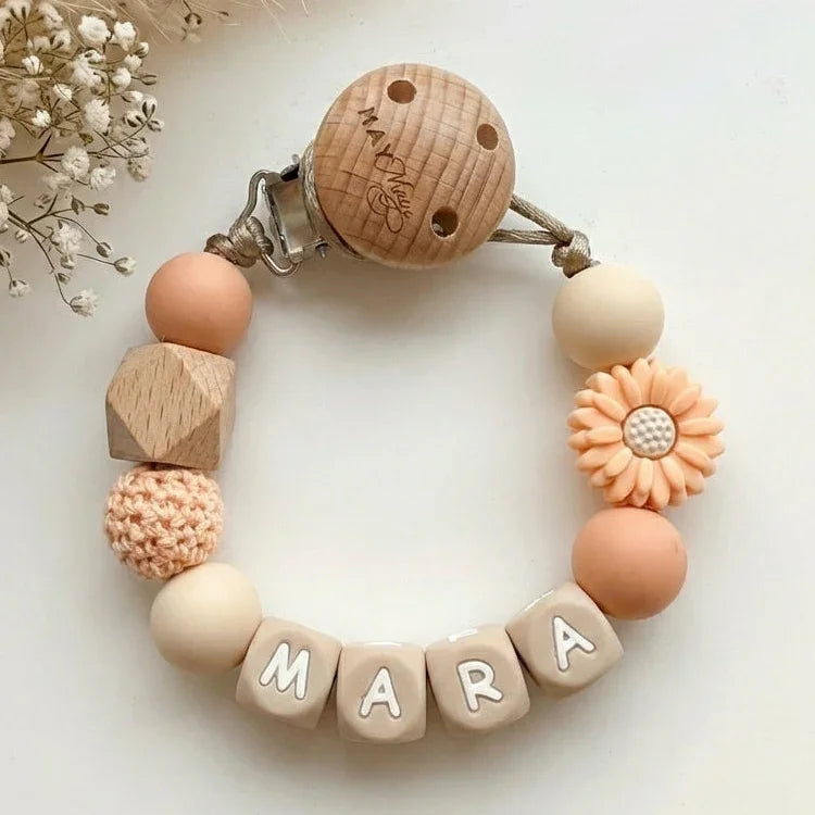 Speenkoord met naam zalm beige bloemetje hout