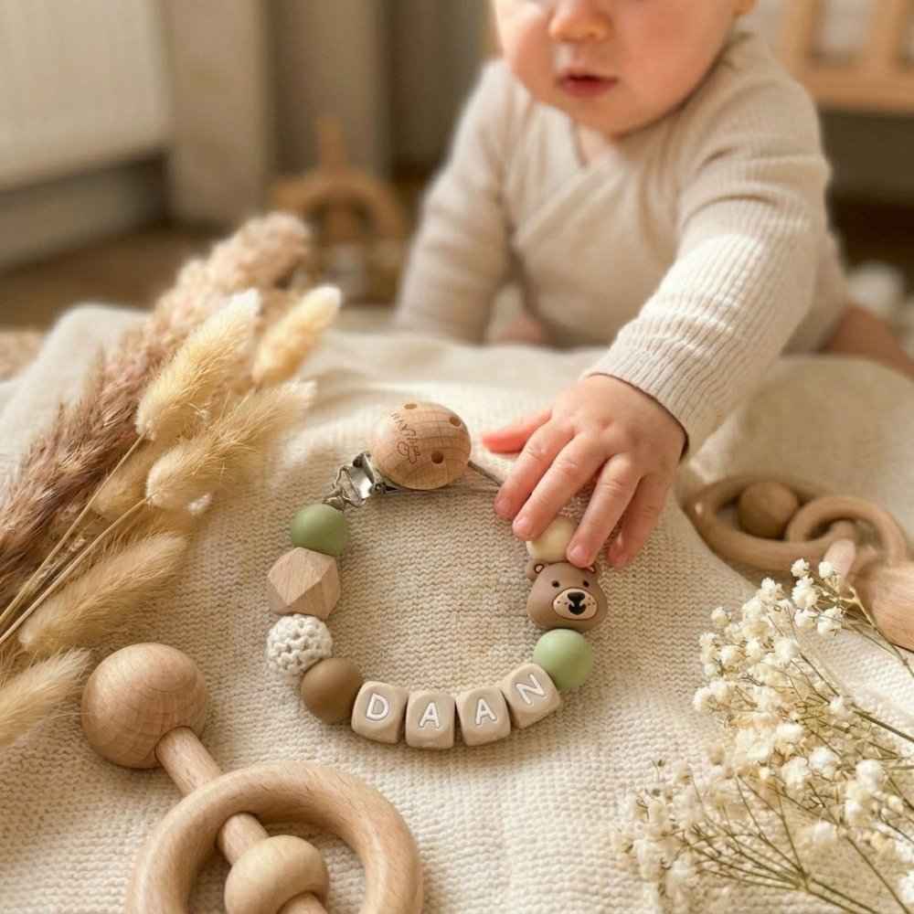 Green pacifier clip with teddy bear name