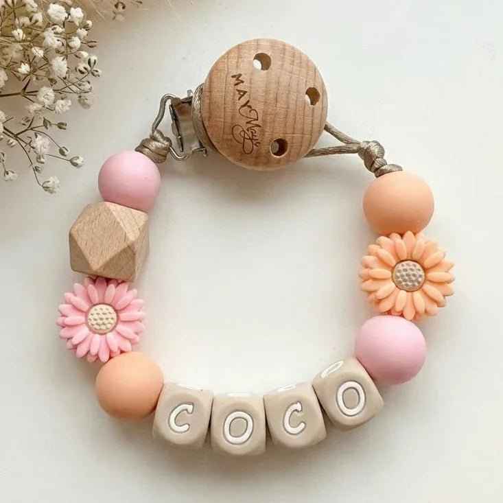Peach drawstring cord with a pink flower