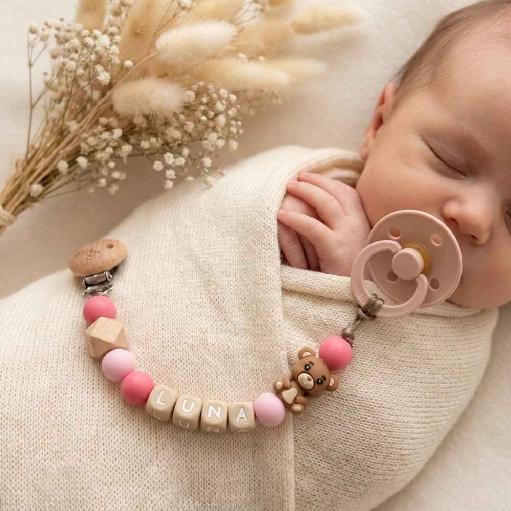 Pacifier strap with the name Pink Bear