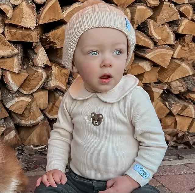 Knitted beige winter hat for Oliver with 1 pompom