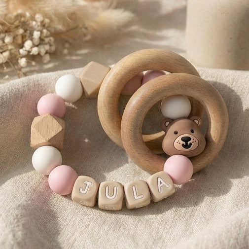 Bijtring met naam beertje roze