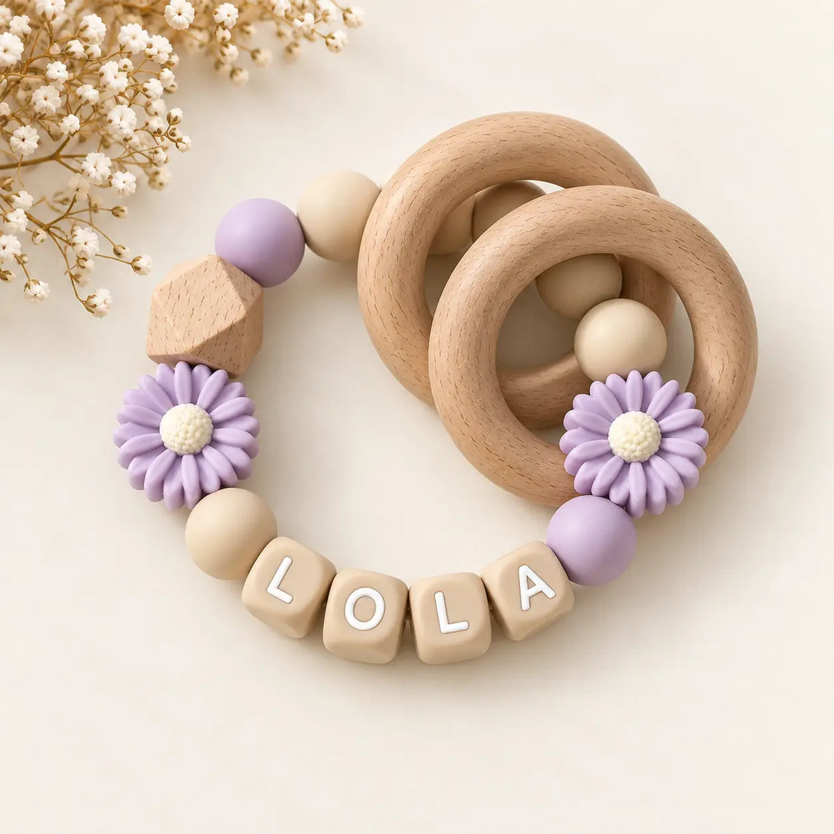 Teething ring with name lilac flowers