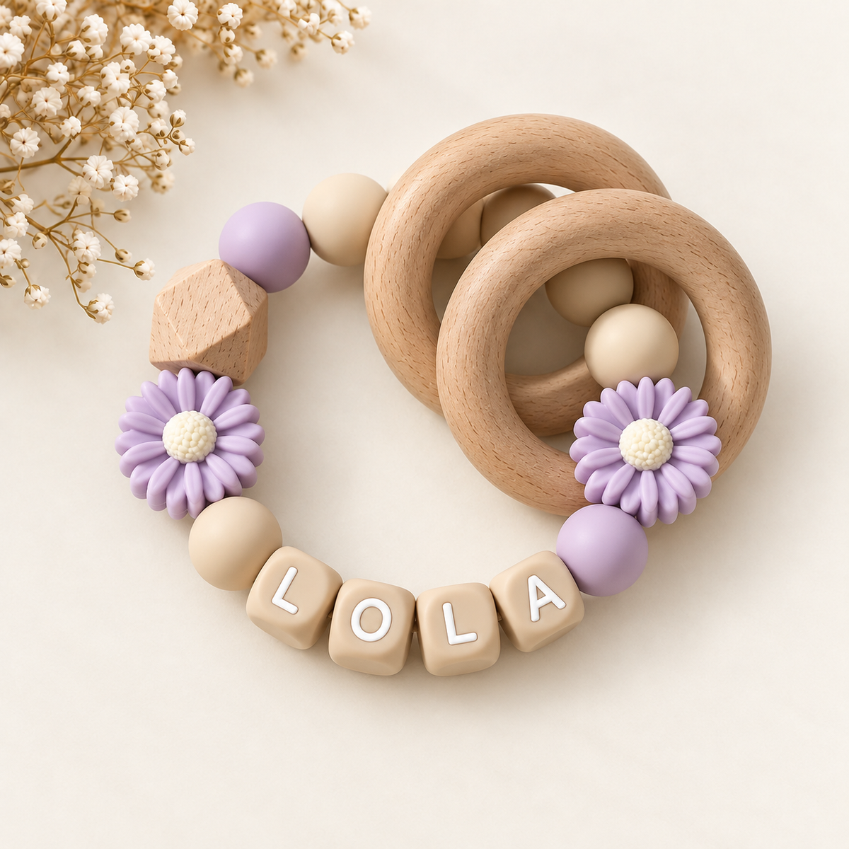 Beißring mit Namen lila Blumen