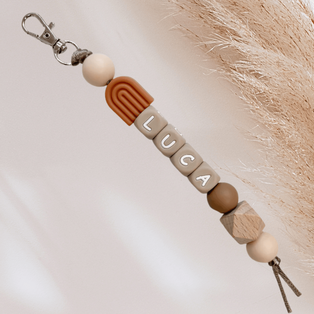 Sleutelhanger met naam regenboog caramel