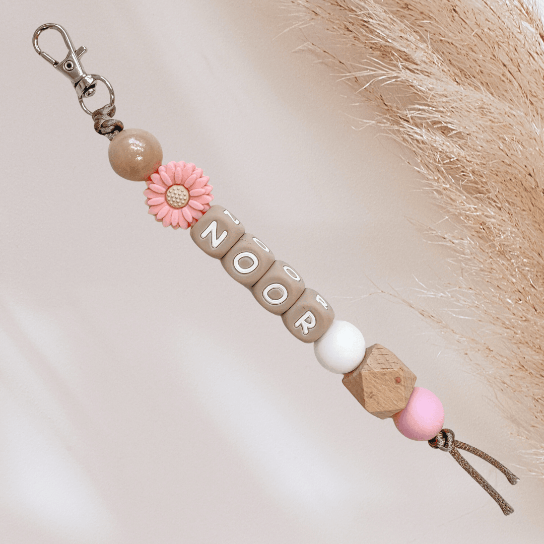 Sleutelhanger met naam goud roze bloem