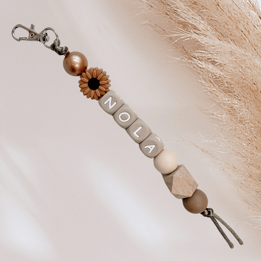 Sleutelhanger met naam bloem bruin brons