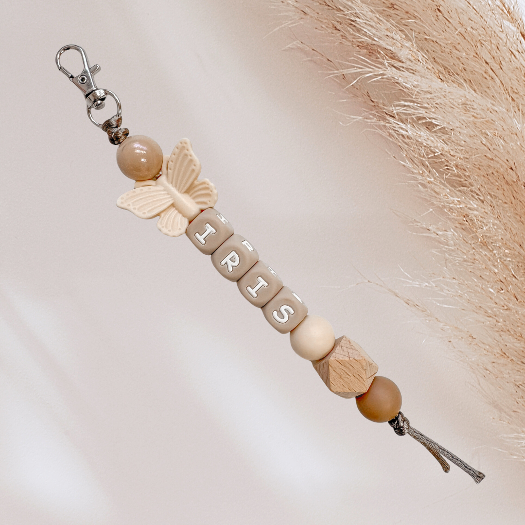 Sleutelhanger met naam vlinder goud naturel