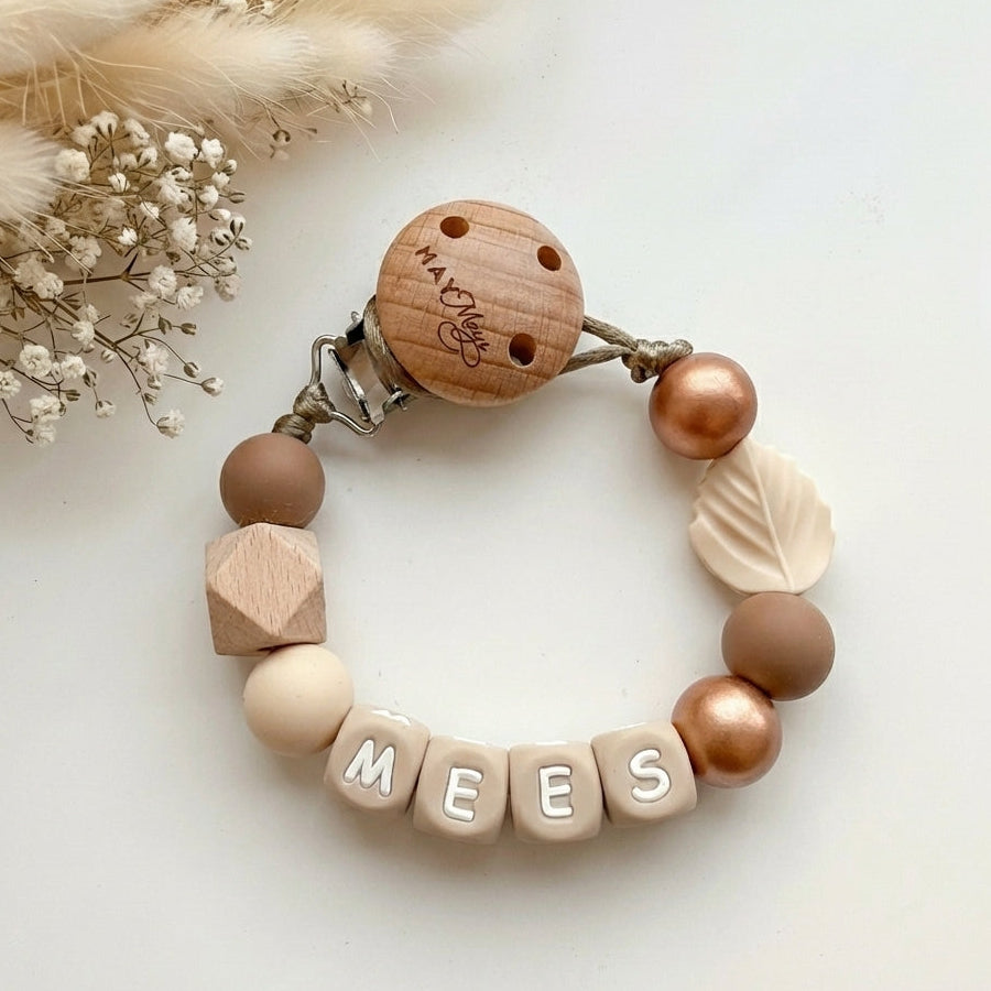 Speenkoord met naam brons blaadje