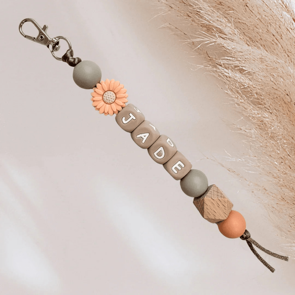 Keychain with a flower name, green and peach