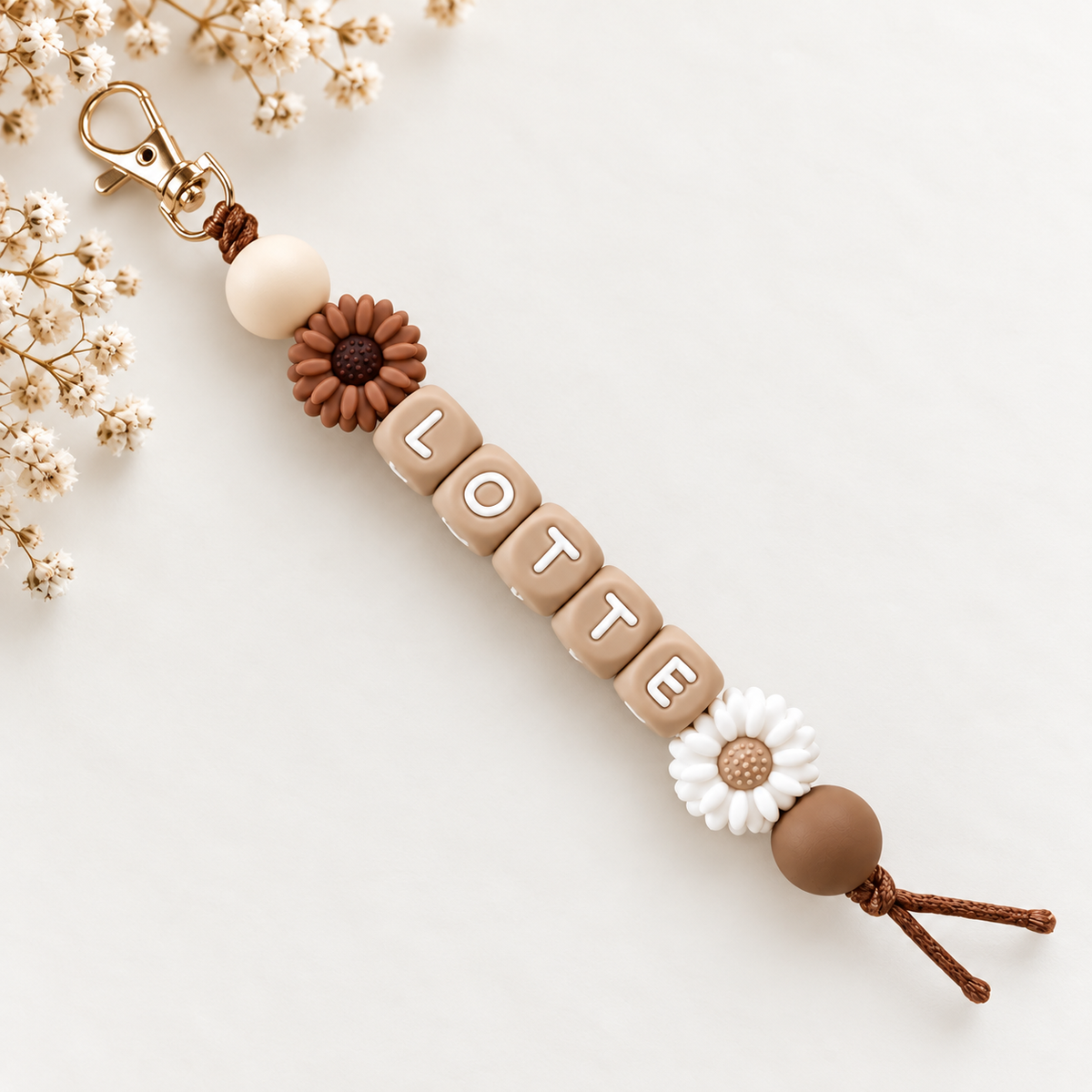 Keychain with name flower brown white
